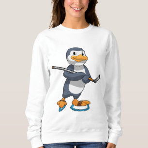Sudadera Pingüino en hockey sobre hielo con bastón de hocke