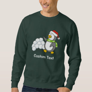 Sudadera Pingüino navidad con bolas de nieve ondeando