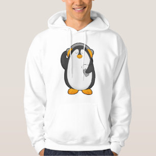 Sudadera Pingüino y teléfono móvil con auriculares