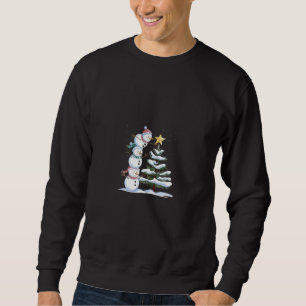 Sudadera "Pirámide de nieve decorando el árbol de Navidad"