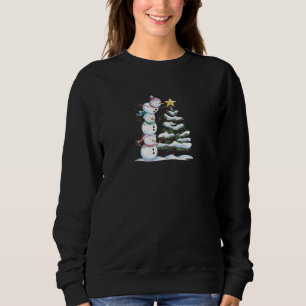 Sudadera "Pirámide de nieve decorando el árbol de Navidad"