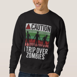 Sudadera Precaución al viajar por Zombies