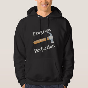 Sudadera Progreso sobre la perfección con un martillo