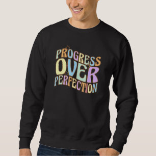 Sudadera Progreso sobre la referencia motivacional a la per