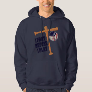 Sudadera Rezo antes de jugar un partido de béisbol