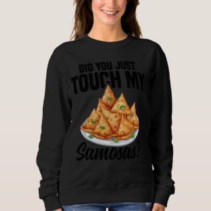 Sudadera Samosas haciendo que la comida india esté congelad