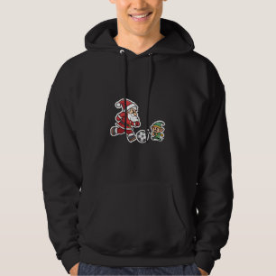 Sudadera Santa Claus Plays Football with a Naughty Goblin