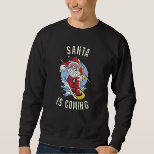 Sudadera Santa está viniendo en snowboard