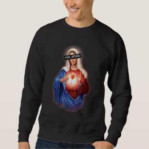 Sudadera Santa Madre Maria Aperol sosteniendo un vaso de vi