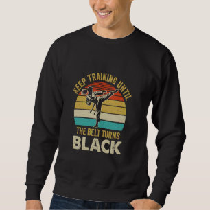 Sudadera Seguir entrenando hasta que el cinturón se vuelva 