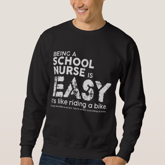 Sudadera Ser enfermera escolar es fácil, es como andar en b (Anverso)