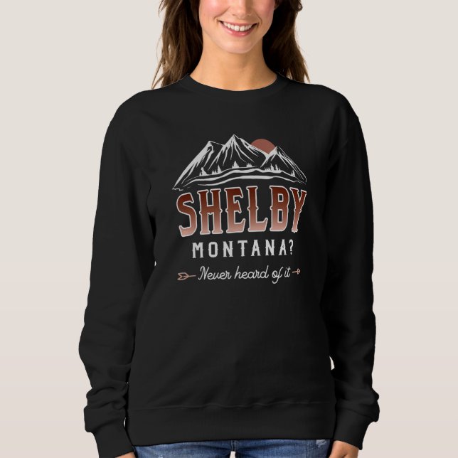 Sudadera Shelby Montana Never Heard of it - MT Conspiracy T (Anverso)