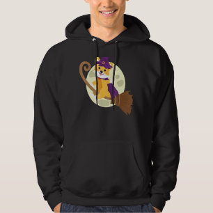 Sudadera Shiba Inu montando en una habitación de brujas con