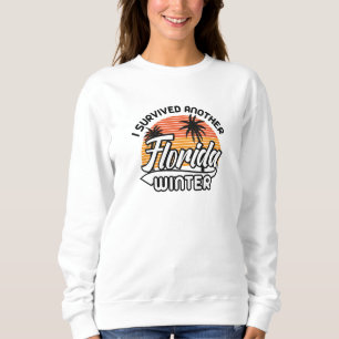 Sudadera Sobreviví a otro invierno en Florida