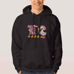 Sudadera Solo una mamá tratando de mantener a sus patos en