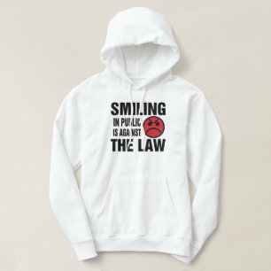Sudadera Sonreír en público va en contra de la ley