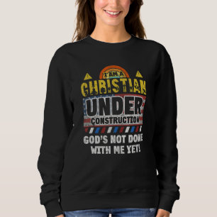 Sudadera Soy cristiano bajo la construcción Dios no está he