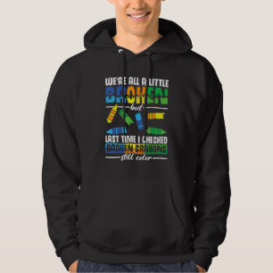 Sudadera Todos estamos un poco rotos, pero todavía hay capu