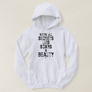 Sudadera Todos somos secretos, mentiras, cicatrices y belle