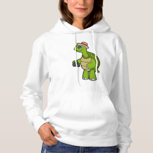Sudadera Tortuga como fotógrafo con cámara