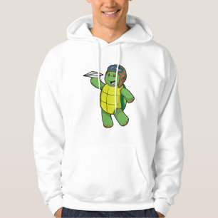 Sudadera Tortuga como piloto con plano de papel