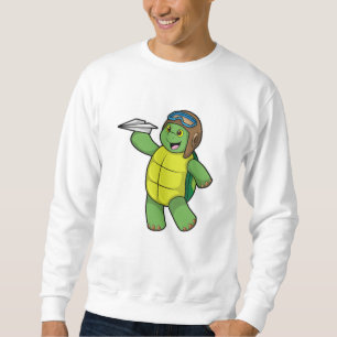 Sudadera Tortuga como piloto con plano de papel