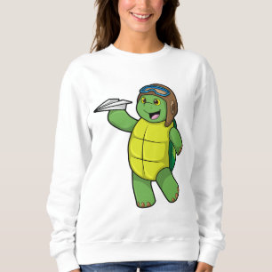 Sudadera Tortuga como piloto con plano de papel