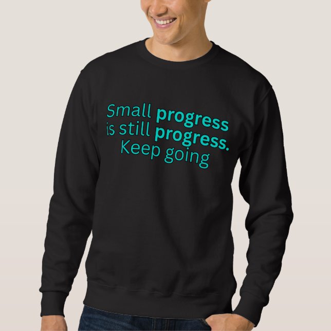 Sudadera Un pequeño progreso sigue siendo progreso. Sigue a (Anverso)