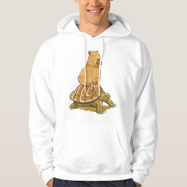 Sudadera Una tortuga animal capibara curiosa cuida al capib (Anverso)