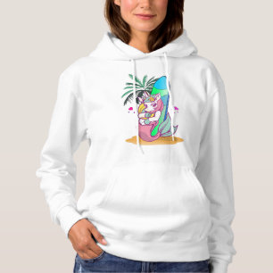 Sudadera Unicornio con tablas de surf en la playa