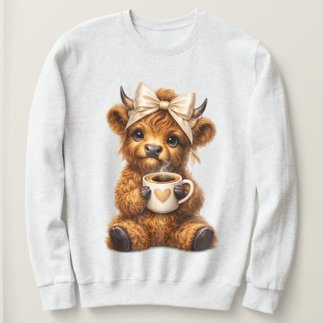 Sudadera Vaca de las Tierras Altas Bebe Café con Lindo Lazo (Anverso del diseño)