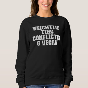 Sudadera Vegan en conflicto con el levantamiento de pesas s