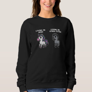 Sudadera Viviendo en Reno Unicornio Arcoíris Humor Nevada E