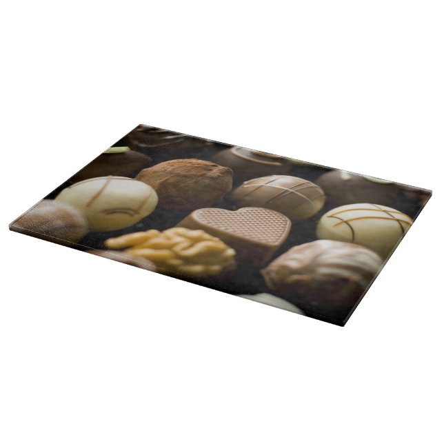 Tabla De Cortar Almendras garapiñadas deliciosas del chocolate (Borde)