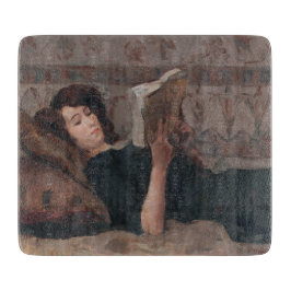 Tabla De Cortar Chica leyendo un libro (Reclinando en un Divan)