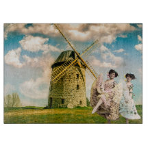 Chicas de flores y molino de viento de danza de la