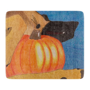 Tabla de cortar con patas de perro y calabaza
