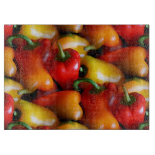 Tabla De Cortar Cubierta de pimientos rojos y amarillos