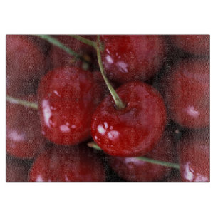 Tabla de cortar de las cerezas