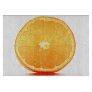 Tabla de cortar de vidrio con rodaja de naranja
