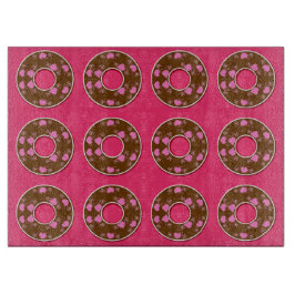 Tabla De Cortar Donuts de chocolate en tablero de corte rosa calie
