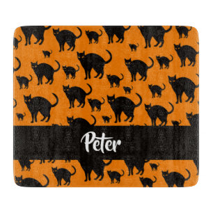 Tabla De Cortar Gatos negros en el naranja