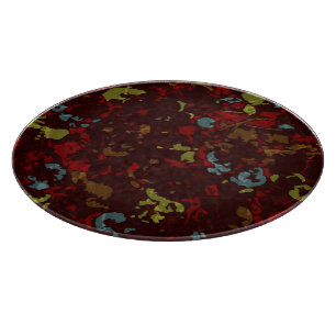 Tabla De Cortar Hojas y flores coloridas contra camuflaje