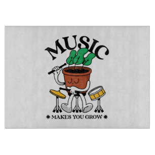 Tabla De Cortar La música hace que crezca el baterista de la plant