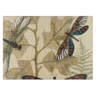 Tabla De Cortar Libélulas coloridas que flotan sobre las hojas