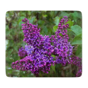 Tabla De Cortar Lilacs morados en el día de primavera
