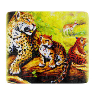 Tabla De Cortar Mamá jaguar y cachorros relajándose en la jungla. 