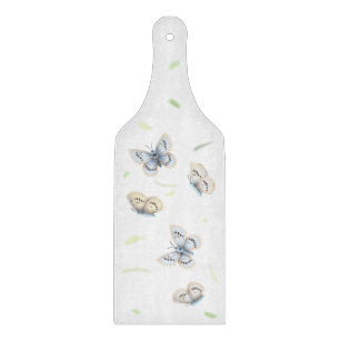 Tabla De Cortar Mariposas azules y de crema en vuelo soñado