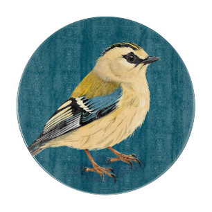 Tabla De Cortar Pájaro enmarcado por flores vibrantes