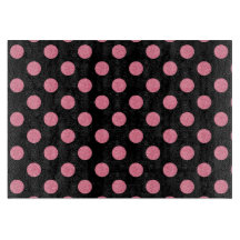 Paquetes de polka rosados sobre fondo negro